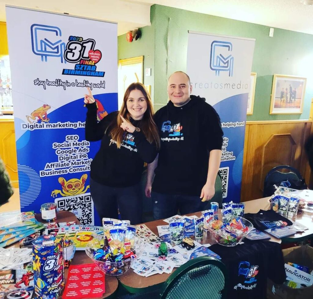 January at Creatos Media: Izzy and Filip stand proudly at their sponsorship booth during the Great Orchestra of Christmas Charity event in Birmingham, showcasing their commitment to social causes and community involvement.